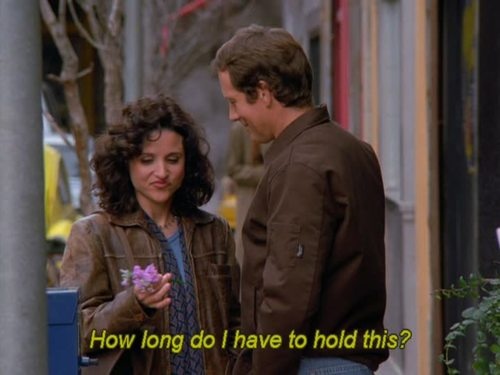 Elaine Holding Flower